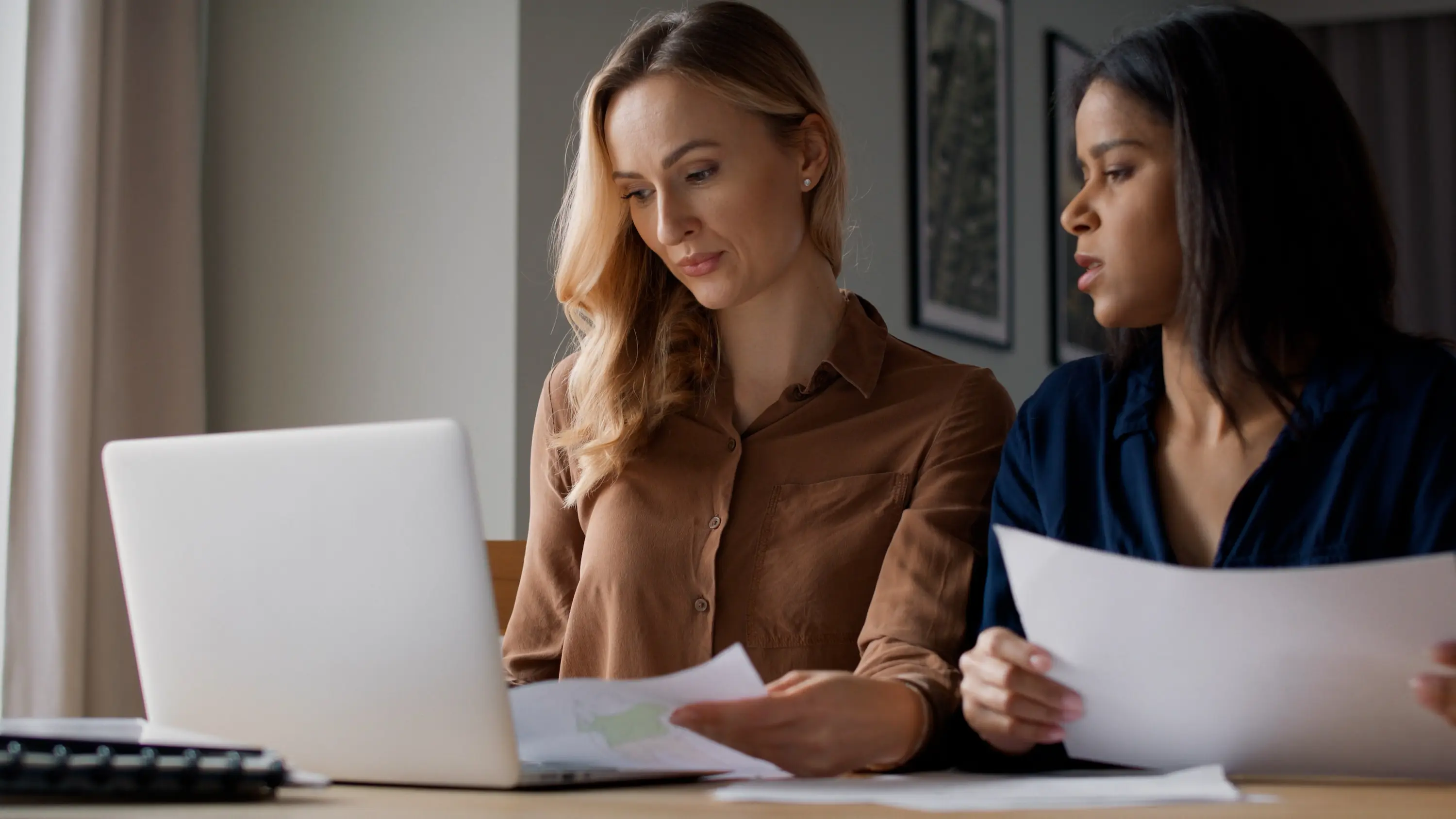 Custom platform development team reviewing data and planning scalable SaaS systems with automation and API integration
