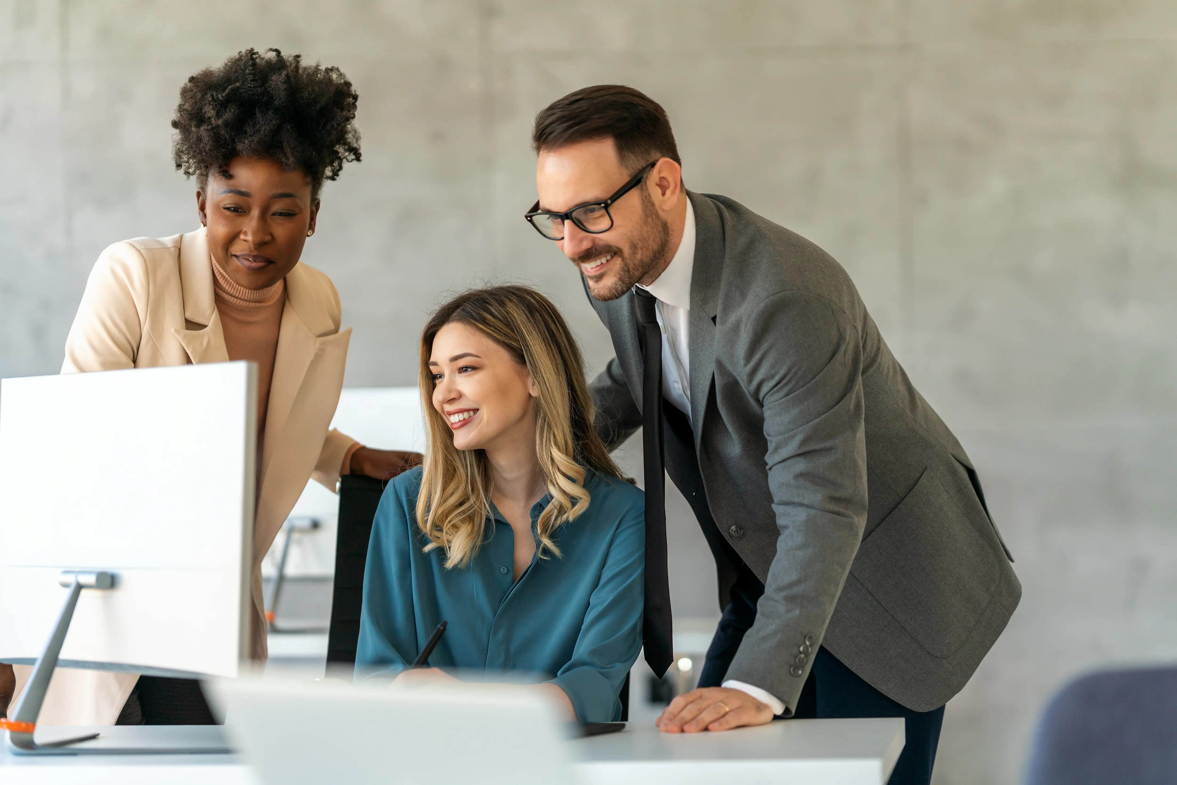 Custom Platform Development, Team working together on digital platform strategy and software development in modern office