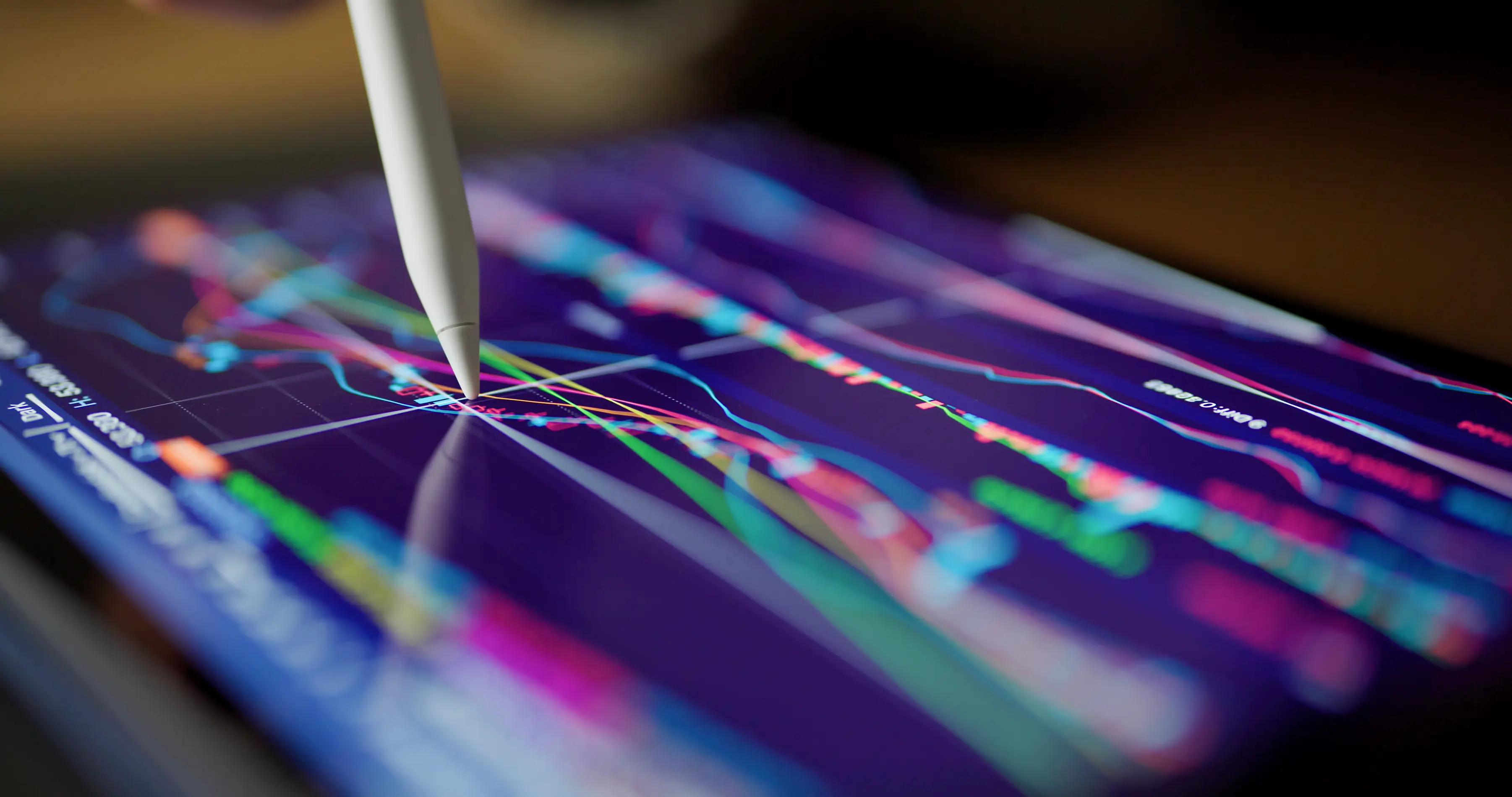 data-driven SEO strategy A stylus interacting with a digital dashboard filled with colorful performance charts, trend lines, and analytics metrics, symbolizing real-time data analysis and strategic decision-making. 